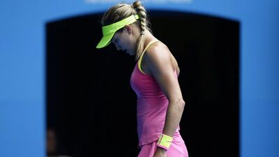 Eugenie Bouchard reacts during her 3-6, 2-6 loss to Maria Sharapova in the Australian Open quarter-finals on Tuesday. Barbara Walton / EPA