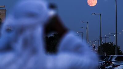 The supermoon rises in the Al Qana area in Abu Dhabi. Victor Besa / The National