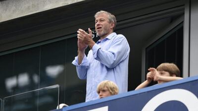 Chelsea owner Roman Abramovich applauds his team during their final match of the Premier League season on Sunday at Stamford Bridge. Tony O'Brien / Action Images / Reuters