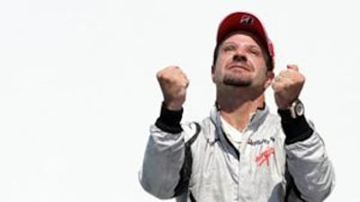 Rubens Barrichello, who is still in contention for the Formula One drivers' championship, celebrates in Valencia after winning the Grand Prix of Europe, one of his two victories this season.