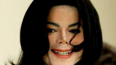 Fans of Michael Jackson have left tributes at an auction of items from the singer’s final home, where he died in 2009. John G Mabanglo / EPA