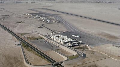 1970s: a single runway stretches across a barren city.