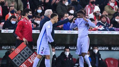 Injured Barca attacker Ansu Fati leaves the pitch in tears. Getty