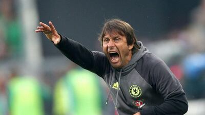 Antonio Conte shouts at his players during the match. Lisi Niesner / EPA
