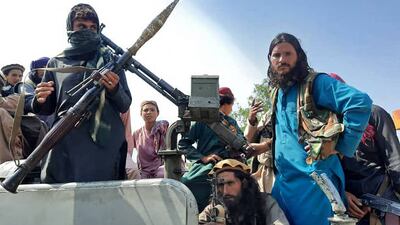 Heavily armed Taliban fighters gather in eastern Laghman province.