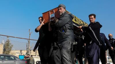 People carry the coffin of an Afghan female judge gunned down in Kabul. EPA