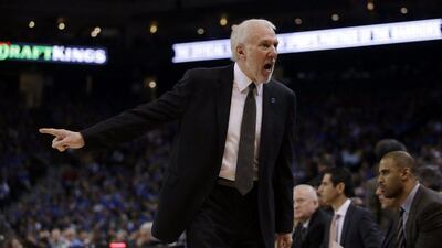 San Antonio Spurs head coach Gregg Popovich yells at players on the bench during his team’s loss to the Golden State Warriors in the NBA on Monday night. Marcio Jose Sanchez / AP