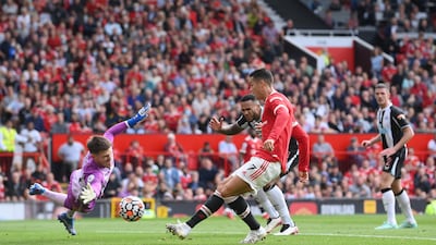 Cristiano Ronaldo scores for Manchester United against Newcastle United during the Premier League match at Old Trafford in September, 2021. Getty