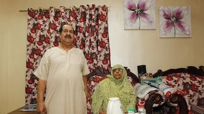 Pensioner Ali Abod wants to see the Government increase healthcare benefits to help his wife Sheikha Saeed . Jeffrey E Biteng / The National.