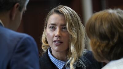Actor Amber Heard testified that she worked in a soup kitchen and with deaf children as a teen-ager in Texas. EPA