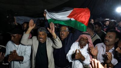 People celebrate after Israel delays eviction of the Palestinian Bedouin village of Khan Al Ahmar, in the occupied West Bank. Reuters