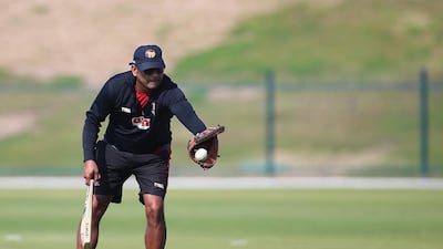 UAE'scricket team coach Aaqib Javed with his team at Zayed Cricket Stadium in Abu Dhabi. Ravindranath K / The National