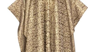Essa Walla's gold brocade kaftan with caligraphy, Dh3,750. Courtesy The cARTel