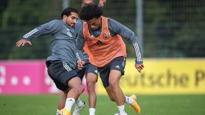 Emre Can tackles Leroy Sane of Germany during a training session at ADM-Sportpark ahead of Germany's Uefa Nations League group stage match against Spain. Getty Images