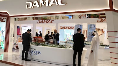 Visitors at the Damac stand on the first day of Cityscape Global.