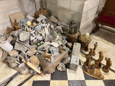 A model of baby Jesus swaddled in a keffiyeh is still in a manger in one of the oldest Lutheran churches in Palestine. Credit: Evangelical Lutheran Christmas Church, Bethlehem. Photo: