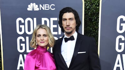Joanne Tucker and Adam Driver, wearing Burberry, arrive at the 77th annual Golden Globe Awards at the Beverly Hilton Hotel on January 5, 2020. AFP