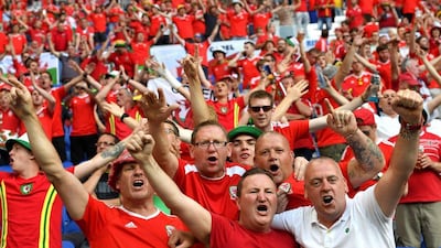 Wales fans cheer prior to the Uefa Euro 2016 semi-final match between Portugal and Wales at Stade de Lyon in Lyon, France, 06 July 2016. Georgi Licovski / EPA