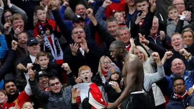 Manchester United's fans celebrate with goalscorer Romelu Lukaku at Old Trafford on Saturday during the win over Southampton. United have announced season ticket prices will remain unchanged for the 2019/20 season. Reuters