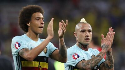 Belgium's Axel Witsel, left, and Radja Nainggolan acknowledge the fans after beating Sweden 1-0 in their Euro 2016 Group E match on Wednesday. Valery Hache / AFP / June 22, 2016