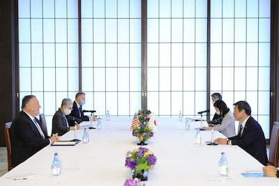 Michael Pompeo, US Secretary of State, left, speaks to Toshimitsu Motegi, Japan's Foreign Minister, right, during a meeting of the 'Quad' in Tokyo in October. Bloomberg