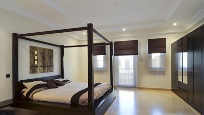 One of the four bedrooms. The property is within walking distance of the beach and golf course. Courtesy Better Homes
