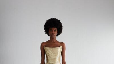 Rami Al Ali showed a molten gold dress in Paris, outside of the haute couture schedule