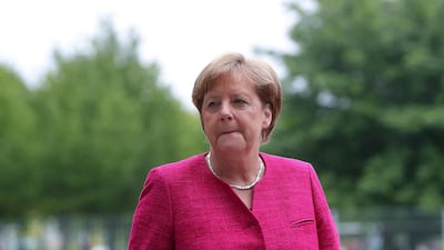 Angela Merkel, Germany's chancellor, awaits the arrival of Pedro Sanchez, Spain's prime minister. Bloomberg