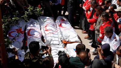 Palestinians in Khan Younis, Gaza, mourn medics who came under Israeli fire while on a rescue mission. Reuters