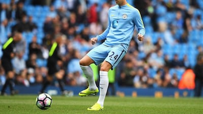 John Stones of Manchester City warms up prior to the match during the Premier League match between Manchester City and Sunderland at Etihad Stadium on August 13, 2016 in Manchester, England. Stu Forster / Getty Images