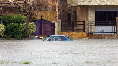 A flooded street in the New Cairo suburb of the Egyptian capital amid a heavy storm, March 12. AFP