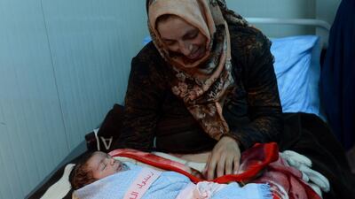 Hannan Al Darwish, 28, gave birth to her daughter just minutes before Sheikha Shamma bint Sultan bin Khalifa Al Nahyan, founder of Beacon of Hope UAE, took a tour of the Red Crescent Sponsered Hospital. The Syrian refugee from Homs said she took it as a sign and named her daughter after the Sheikha. Naser Al Wasmi / The National