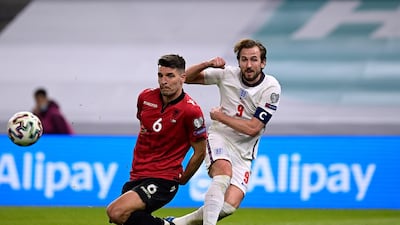 Harry Kane of England battles for possession with Berat Djimsiti of Albania. Getty