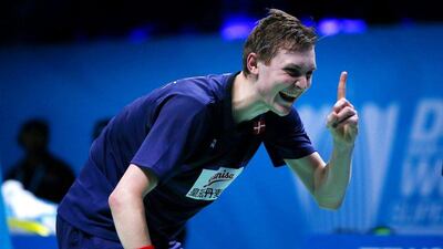 Viktor Axelsen of Denmark celebrates winning the men's final match against Tian Houwei at the Dubai World Superseries Finals on Sunday. Charlie Crowhurst / Getty Images / December 18, 2016