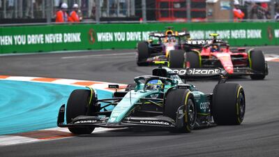 Aston Martin driver Fernando Alonso ahead of Ferrari's Carlos Sainz, who finished fifth, and Red Bull's Max Verstappen. AFP