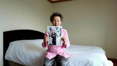 A South Korean separated family member Lee Chun-ja (88) holds a her wedding picture to give his North Korean family at Hanwha resort on Sokcho in Gangwon-do, South Korea. EPA