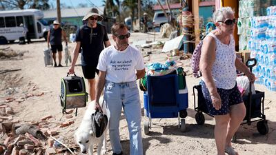 Many island residents were waiting to be moved to safety with their pets. Getty / AFP