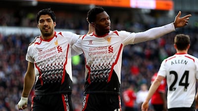 Daniel Sturridge, right, has 26 goals in 20 Premier League matches for Liverpool this season. Luis Suarez, left, has 30 in 30. Ben Hoskins / Getty Images