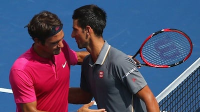 Novak Djokovic, right, of Serbia congratulates Roger Federer of Switzerland after during their final round match at the Western & Southern Open at the Lindner Family Tennis Center on August 23, 2015 in Cincinnati, Ohio. Maddie Meyer/Getty Images/AFP
