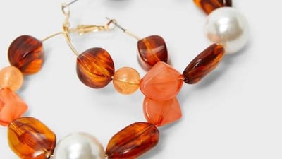 Stone hoop earrings Dh49, Stradivarius. Courtesy Stradivarius