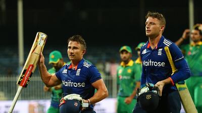James Taylor, left, and Jos Buttler put on a 117-run partnership as England chased down Pakistan's total with nine overs to spare in Sharjah on Tuesday. Marwan Naamani / AFP