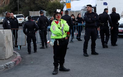 Az-Oolay and Israeli police officers in Sheikh Jarrah, occupied East Jerusalem, on December 10. EPA
