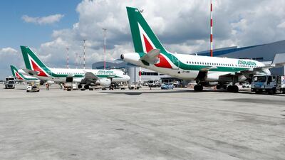 Alitalia planes on the tarmac at Fiumicino International Airport in Rome. The airline's successor, ITA, has been struggling to get off the ground due to a dispute with the EU over state aid rules. Reuters
