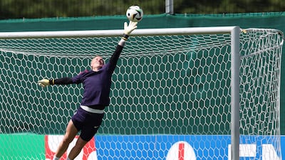 England goalkeeper Jordan Pickford makes a save. AFP