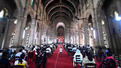 Christian devotees take part in a Good Friday service at All Saints' Cathedral in Allahabad, India on April 2, 2021. AFP