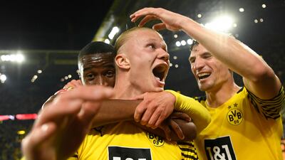 Haaland (C) celebrates scoring the winner. AFP