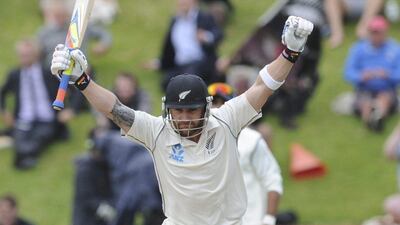 New Zealand’s Brendon McCullum celebrates his triple century against India on the final day of the second Test v India. Ross Setford/ SNPA / AP