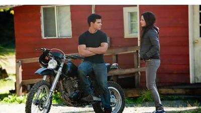 The repeated protestations of love by Jacob, played by Taylor Lautner, left, for the character Bella, played by Kristen Stewart, right, become wearisome in The Twilight Saga: Eclipse .