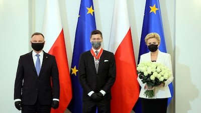 Robert Lewandowski with Polish President Andrzej Duda and First Lady Agata Kornhauser-Duda. EPA