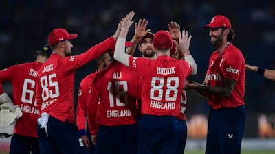 England players celebrate after the dismissal of Pakistan's Khushdil Shah. AFP